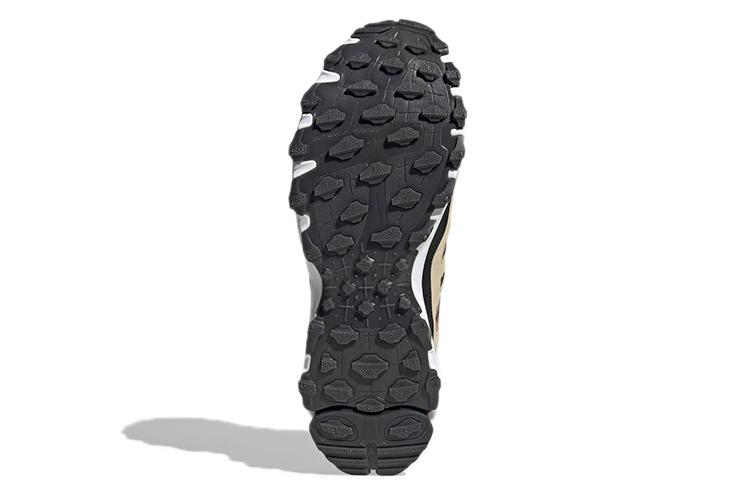 Спортивные ботинки унисекс Adidas Superturf Adventure savanna magic earth, 46 EU