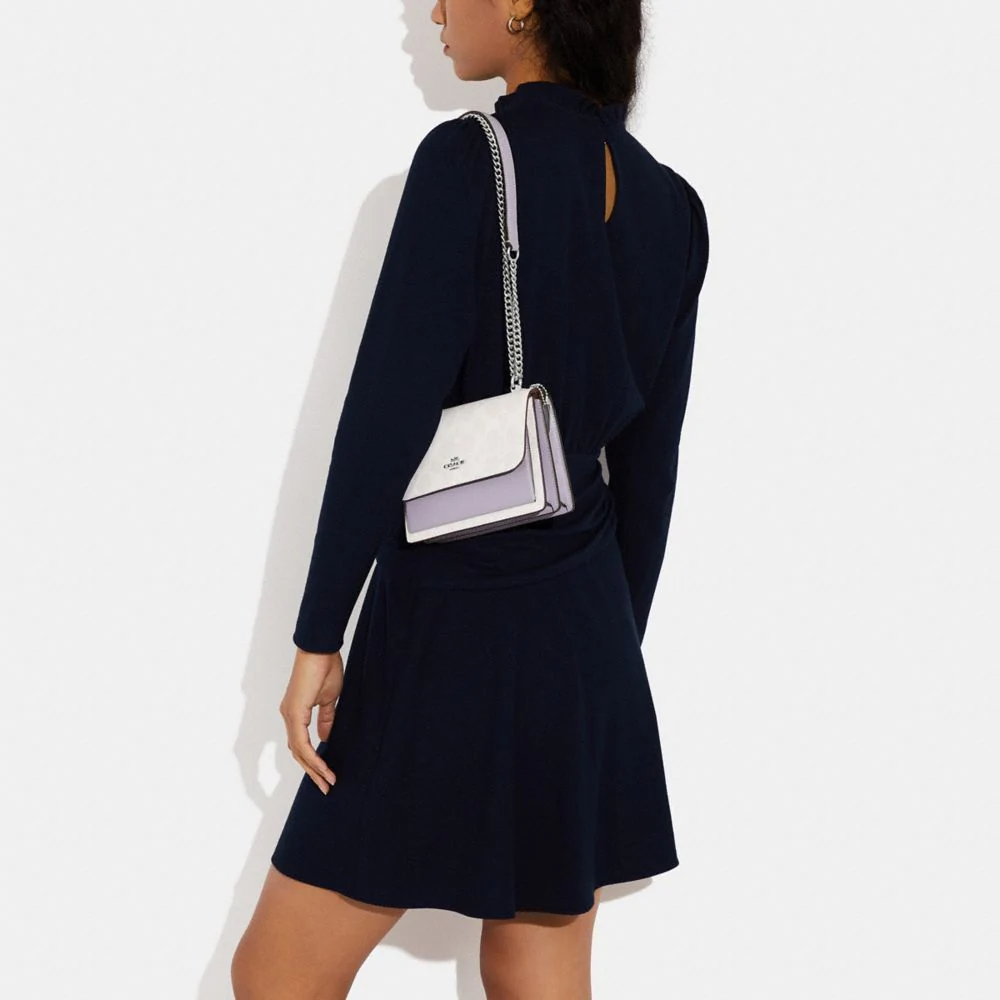 Сумка женская COACH Klare Canvas With Leather Shoulder Bag Mini белая и таро фиолетовая