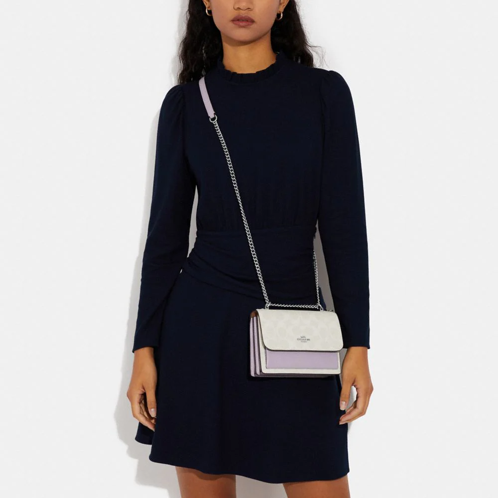 Сумка женская COACH Klare Canvas With Leather Shoulder Bag Mini белая и таро фиолетовая