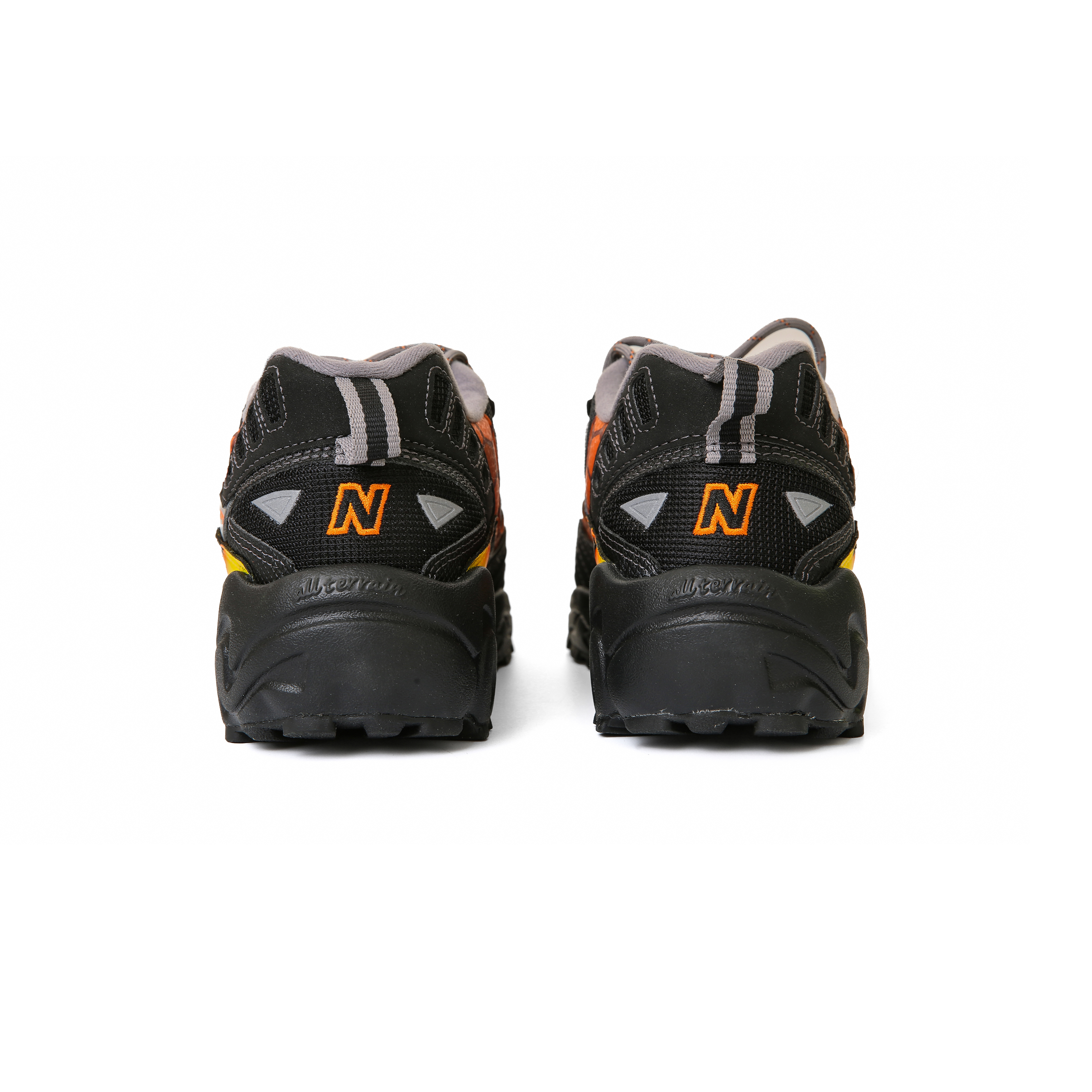 Кроссовки унисекс New Balance NB 703 черно-оранжево-синие, 41.5 EU