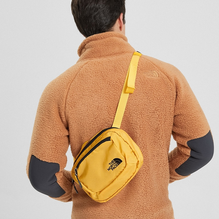 Сумка унисекс THE NORTH FACE 3L Fanny Pack имбирно-жёлтого цвета